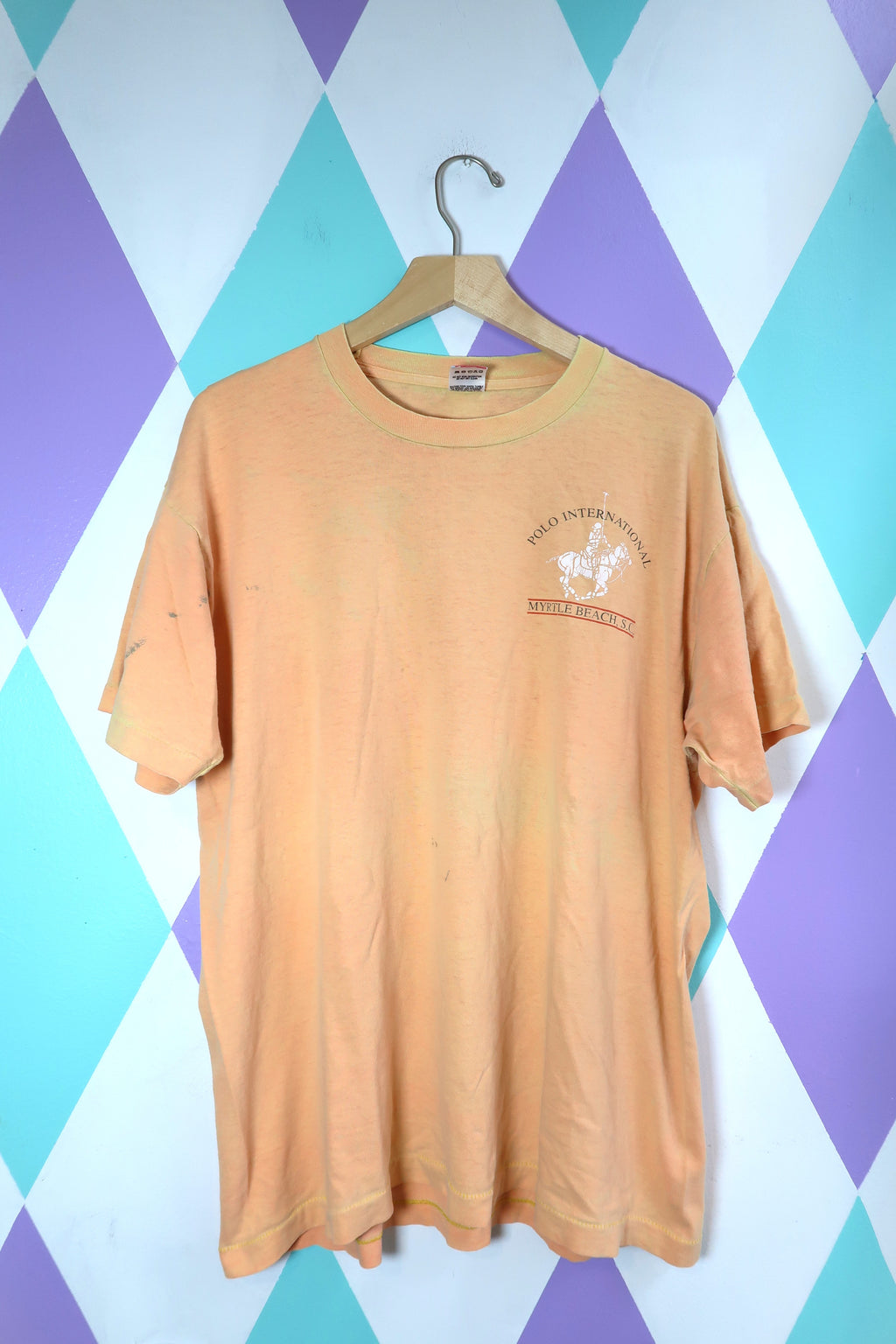 Vintage "Polo International" Myrtle Beach Graphic Tee – Distressed Peach Souvenir Shirt