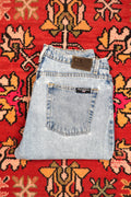 Men's vintage light wash distressed denim jeans from Polo Jeans Co. by Elektra Vintage, showcasing worn-in style and classic fit.