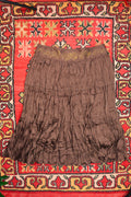 Elegant vintage brown satin crepe midi skirt by Elektra Vintage with gold embroidered waistband and classic 1970s style.