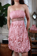 Elektra Vintage pink rosette strapless cocktail dress with vintage design, featuring floral details and elegant silhouette.