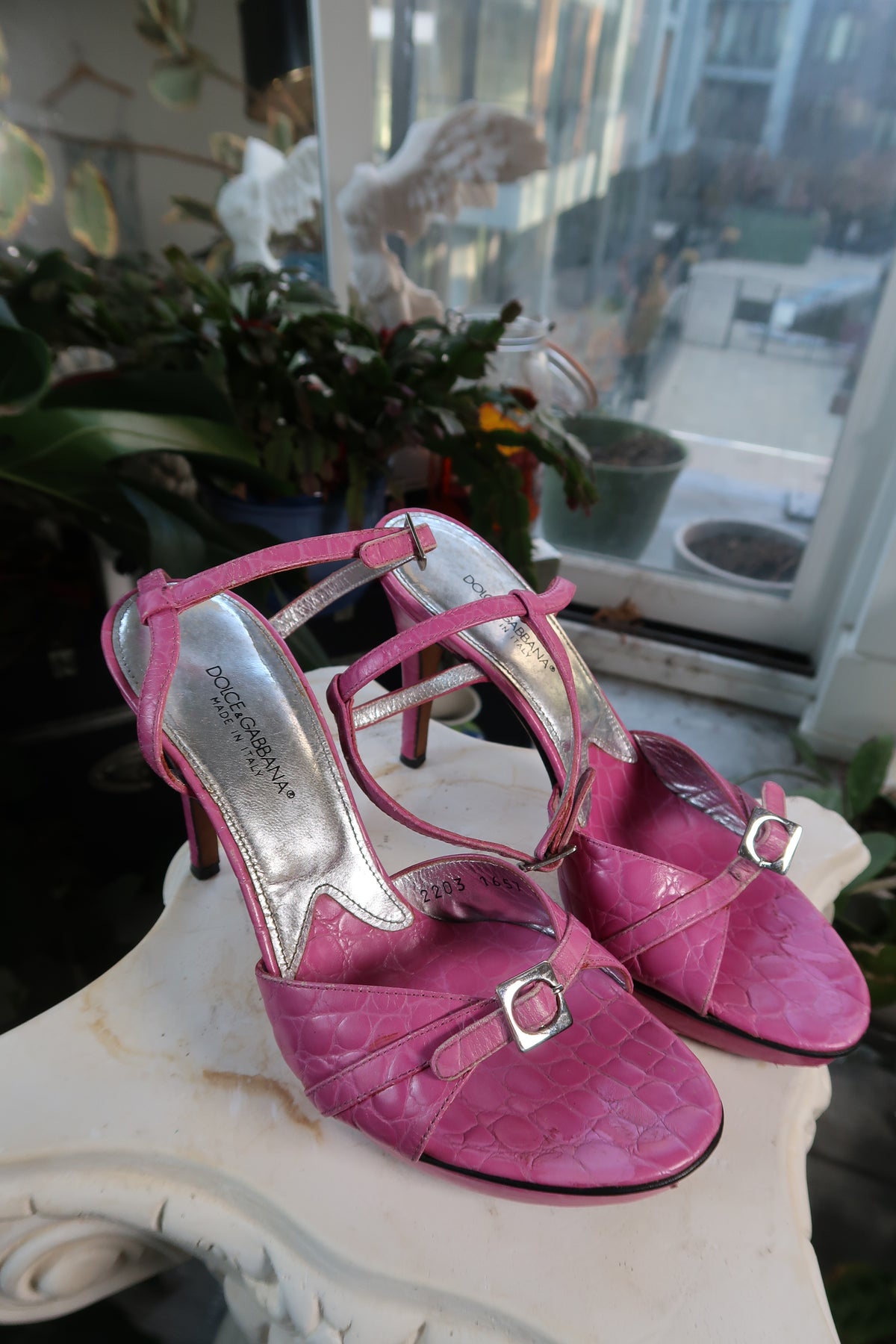 Dolce Gabbana vintage pink alligator leather platform heels with ankle straps, shown on a white background.
