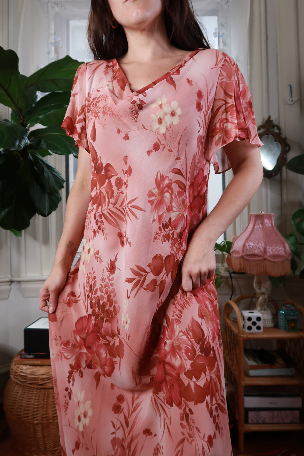Vintage Elektra Vintage pink floral silk maxi slip dress with elegant straps and flowing fabric, perfect for sophisticated occasions.