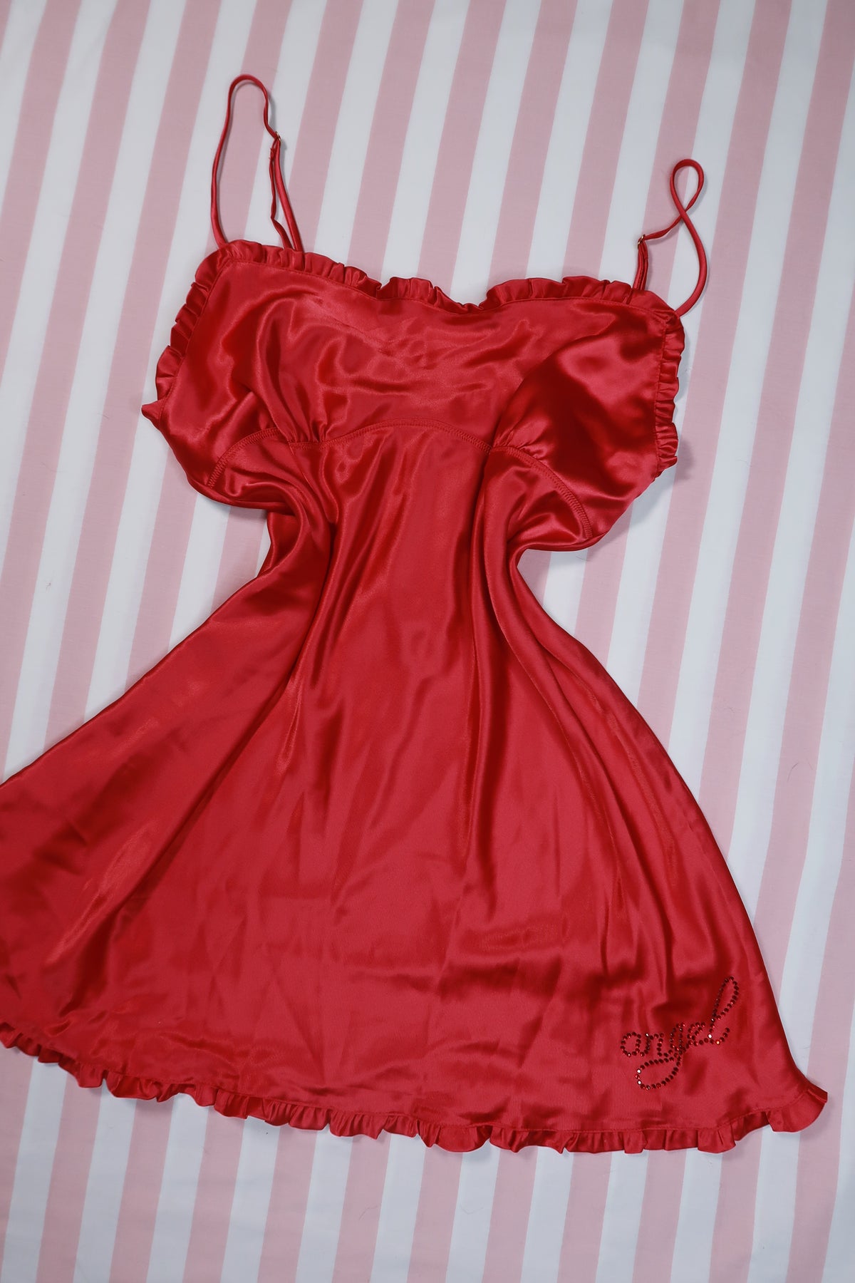 Vintage 2000s Victoria’s Secret red satin angel rhinestone slip dress by Elektra Vintage, featuring a silky fabric and rhinestone details.