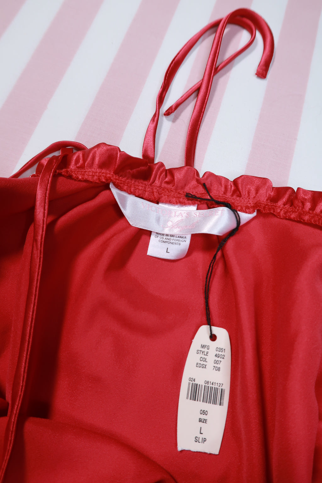 Vintage 2000s Victoria’s Secret red satin angel rhinestone slip dress by Elektra Vintage, featuring a silky fabric and rhinestone details.