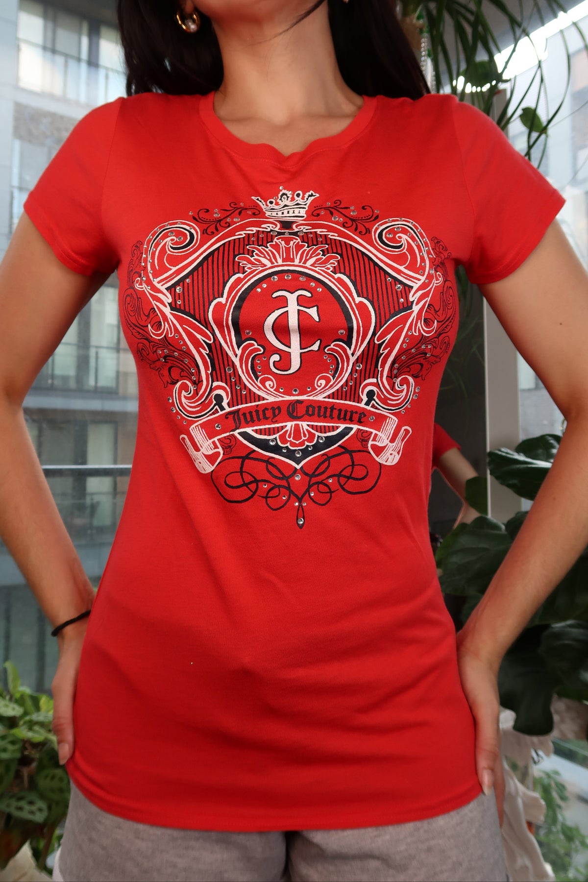 Women's fitted red Juicy Couture crest logo graphic tee with short sleeves, styled by Elektra Vintage.