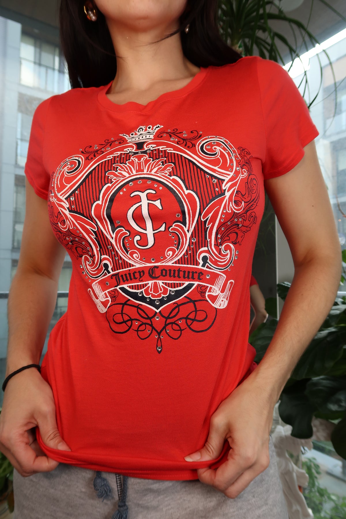 Red Juicy Couture crest logo graphic fitted women's short sleeve tee, casual top from Elektra Vintage.