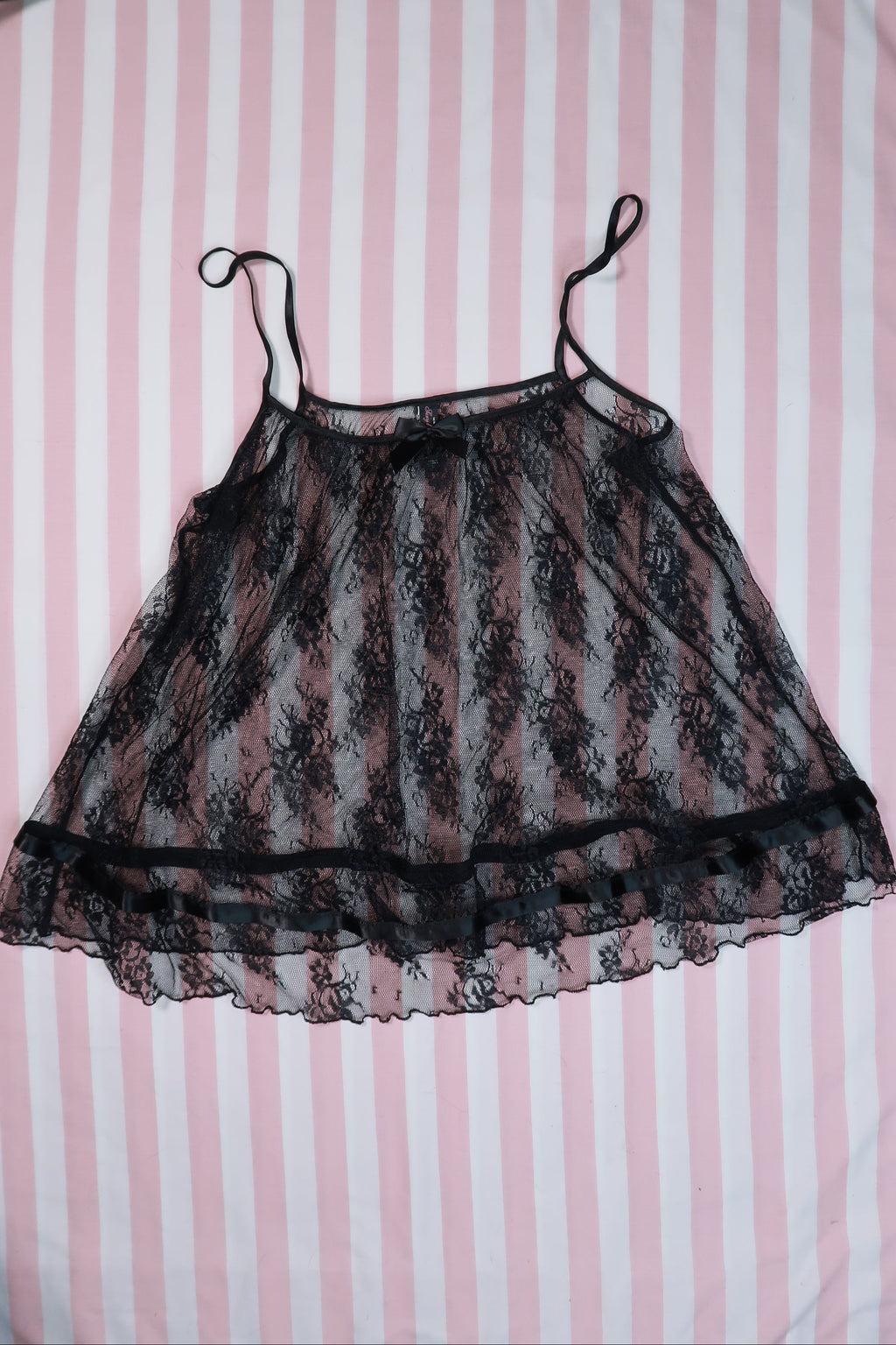 Vintage 2000s Victoria’s Secret sheer black lace babydoll camisole top for women, featuring delicate lace and a feminine fit.