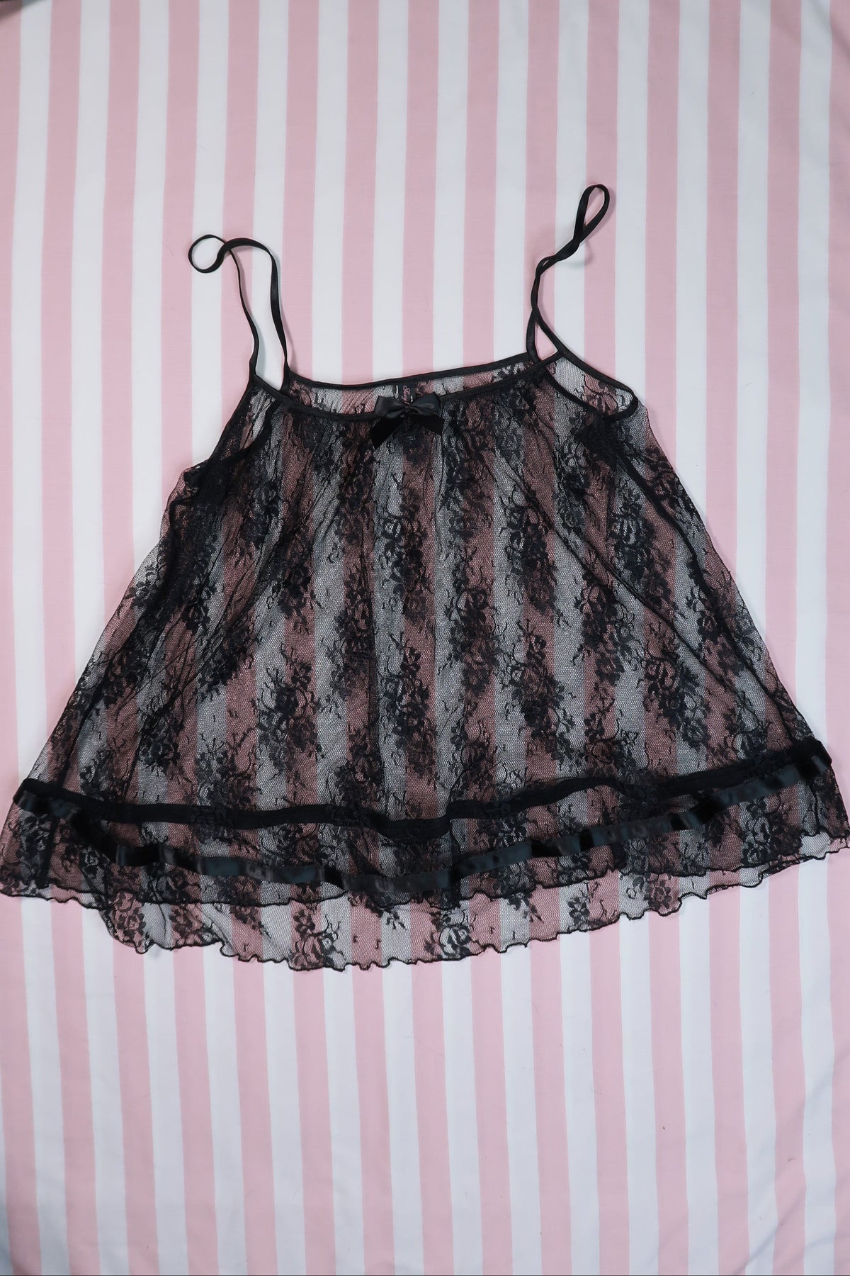 Vintage 2000s Victoria’s Secret sheer black lace babydoll camisole top for women, featuring delicate lace and a feminine fit.