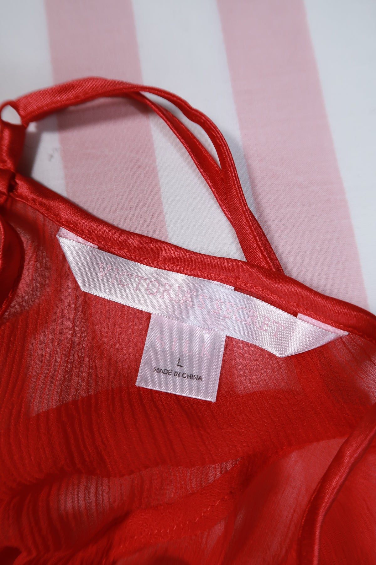 Vintage 2000s Victoria's Secret red silk sheer negligee slip dress with delicate straps and flowing silhouette.
