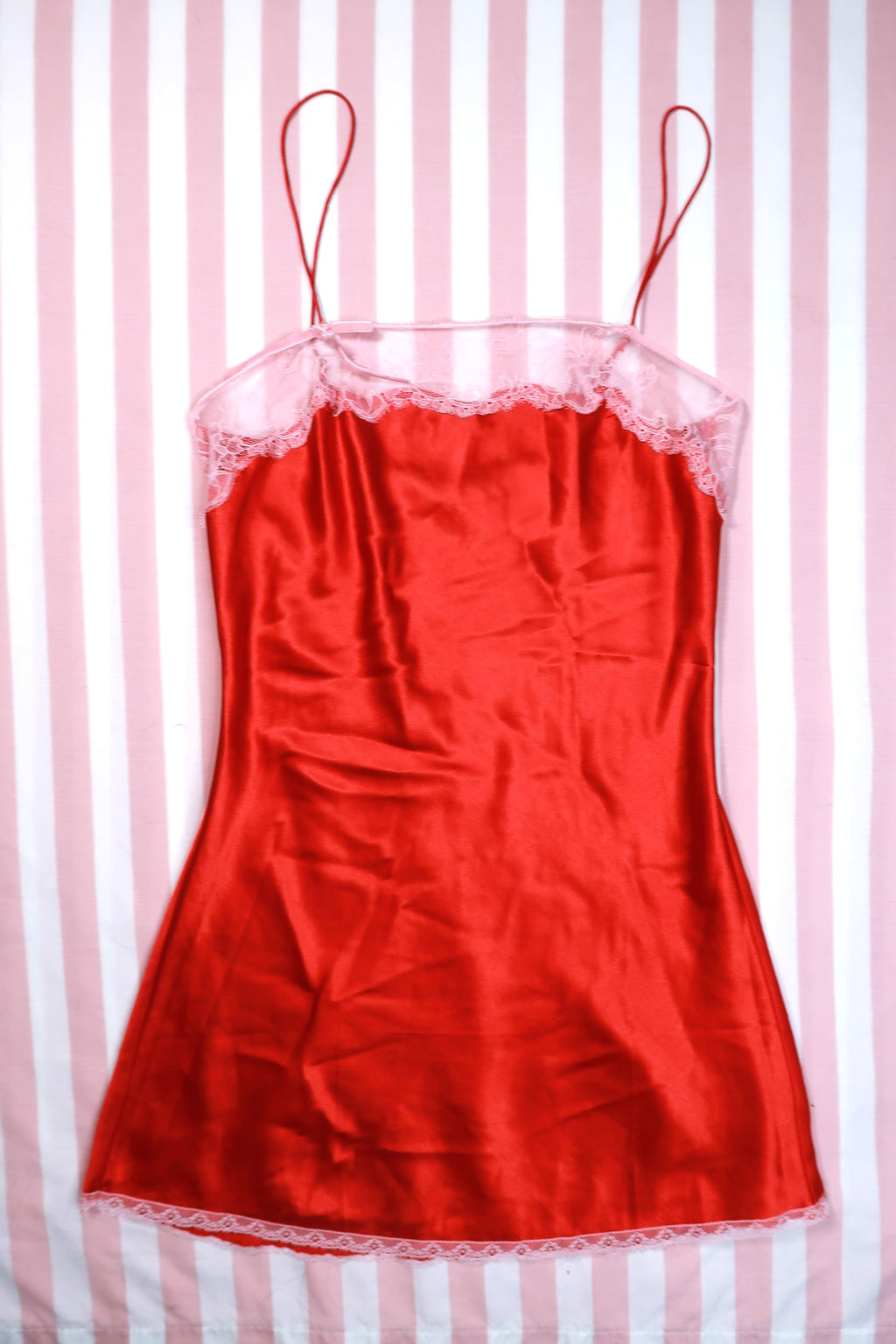 Vintage 2000s Victoria’s Secret red satin lace trim slip dress by Elektra Vintage, featuring elegant satin fabric and delicate lace accents.