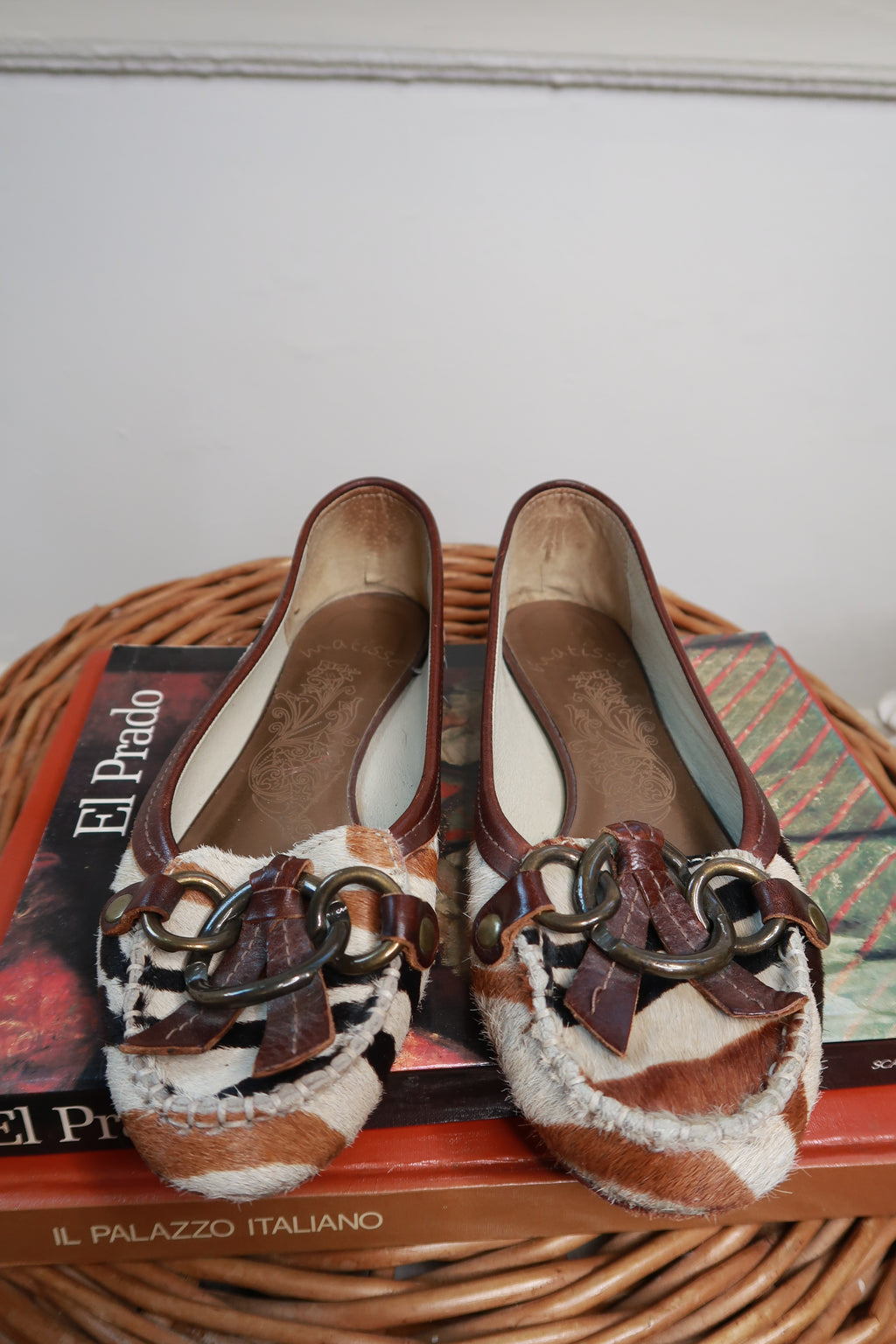 Vintage zebra print calf hair leather loafers by Elektra Vintage, featuring black and white striped design and classic slip-on style.