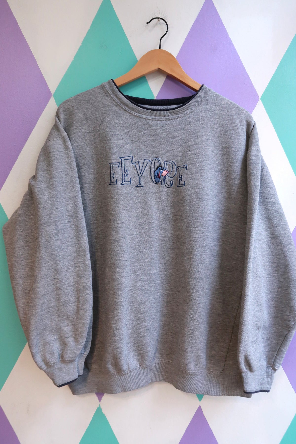 Vintage Eeyore embroidered crewneck sweatshirt by Elektra Vintage, featuring a classic design and soft fabric.