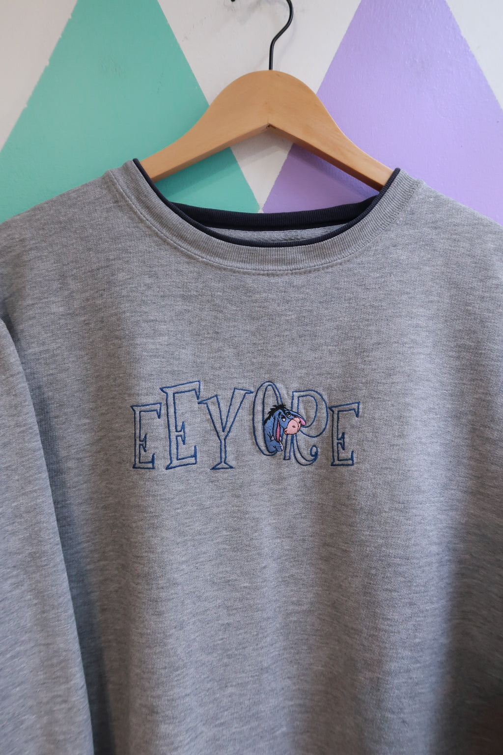 Vintage Eeyore embroidered crewneck sweatshirt by Elektra Vintage featuring a classic design and soft fabric.