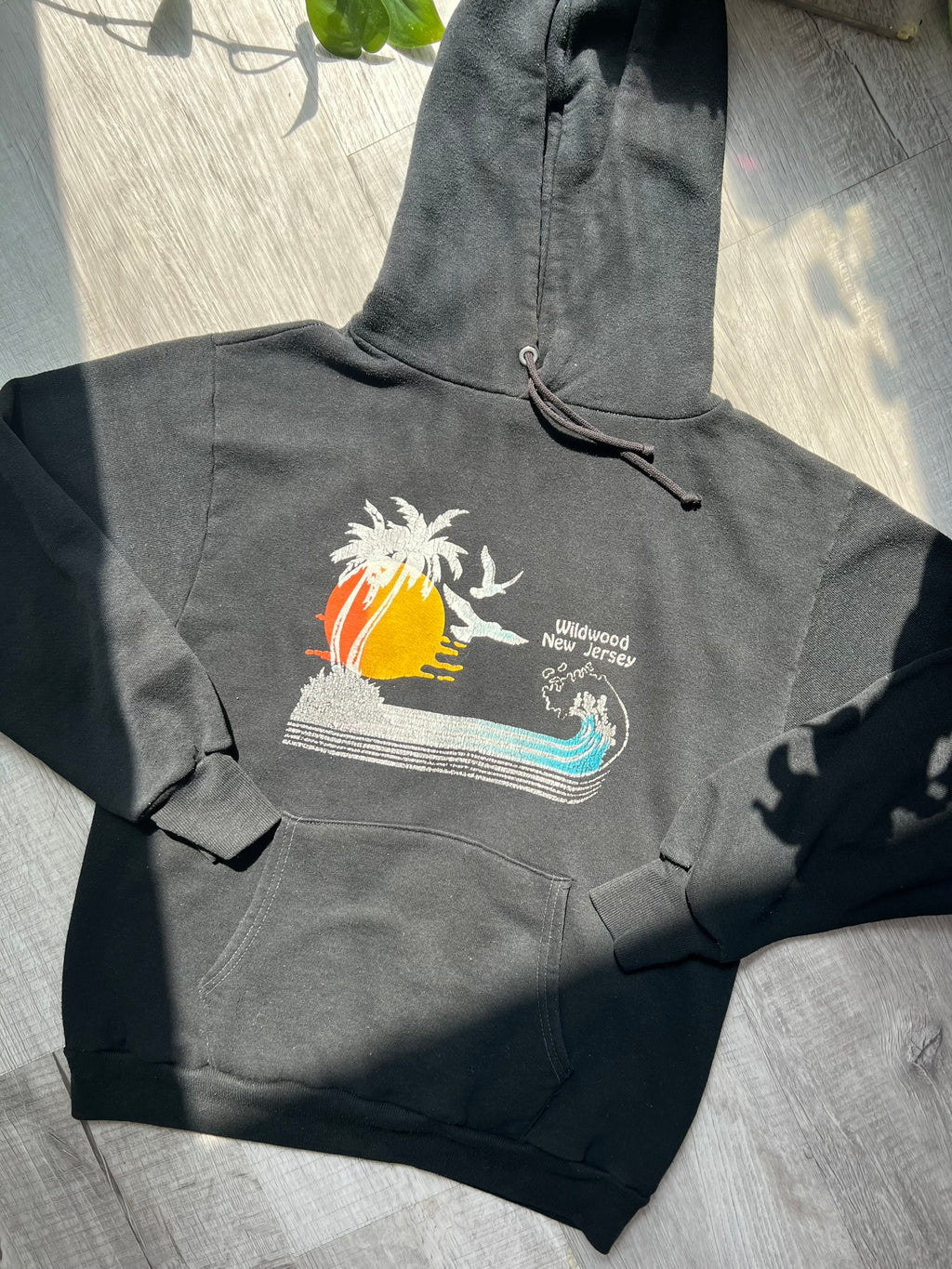 Black 80s Vintage Wildwood New Jersey hoodie by Russell, featuring retro design and Elektra Vintage branding