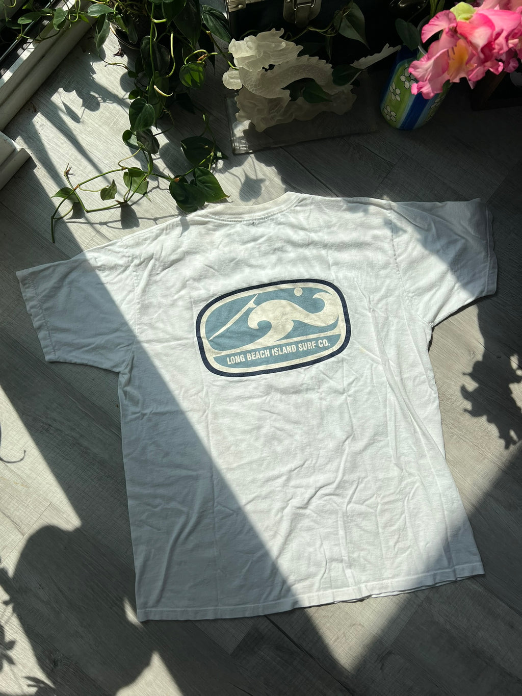 Vintage Long Beach Island Surf Co. T-Shirt by Elektra Vintage featuring a retro surf design on soft cotton fabric.
