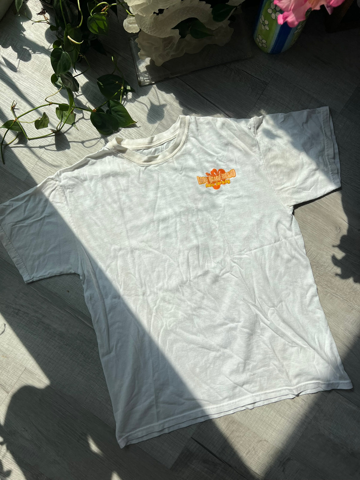 Vintage Elektra Vintage Long Beach Island graphic tee with colorful beach design on soft cotton fabric.