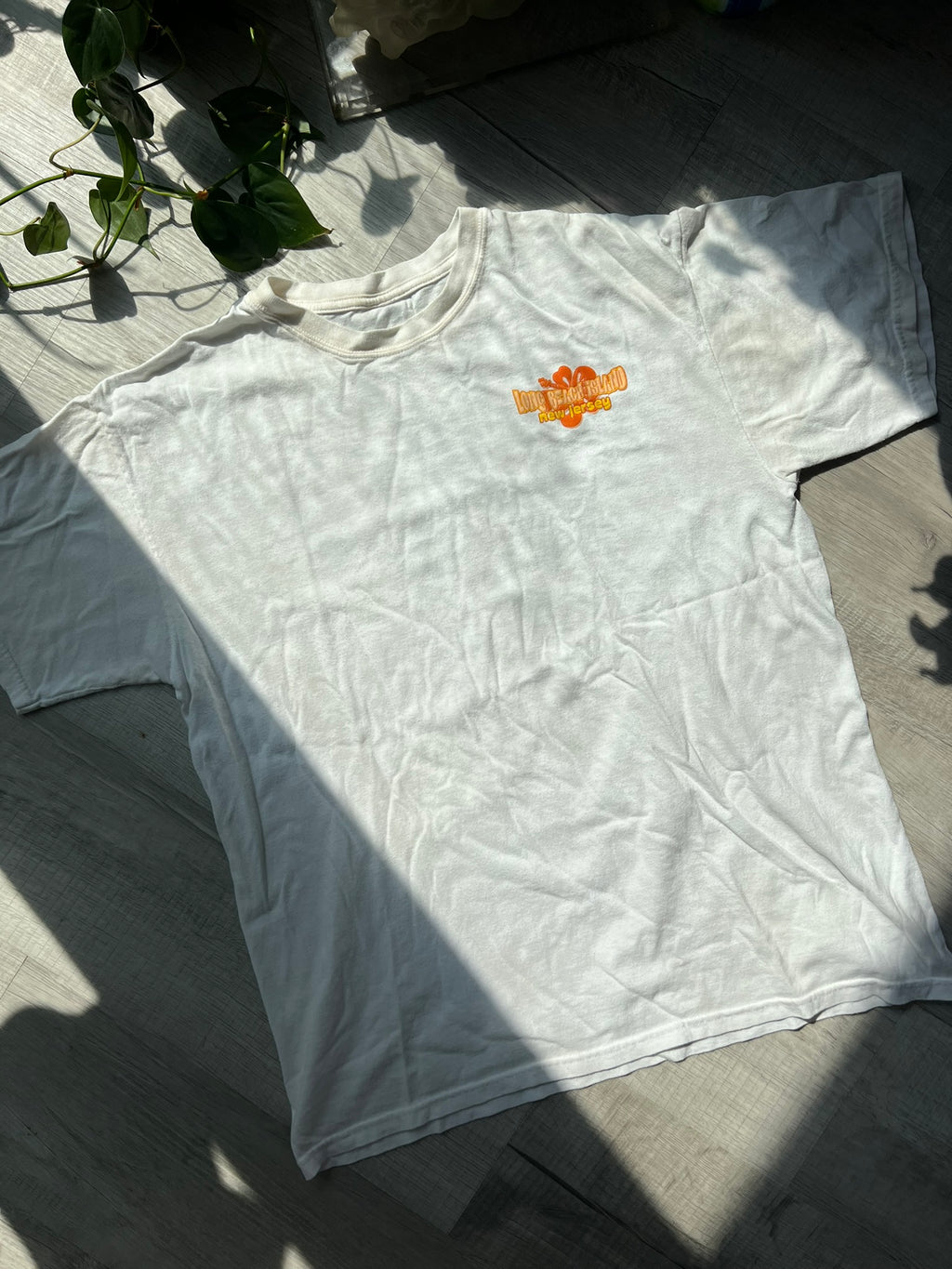 Vintage Long Beach Island graphic tee by Elektra Vintage featuring a colorful beach design on a soft fabric.
