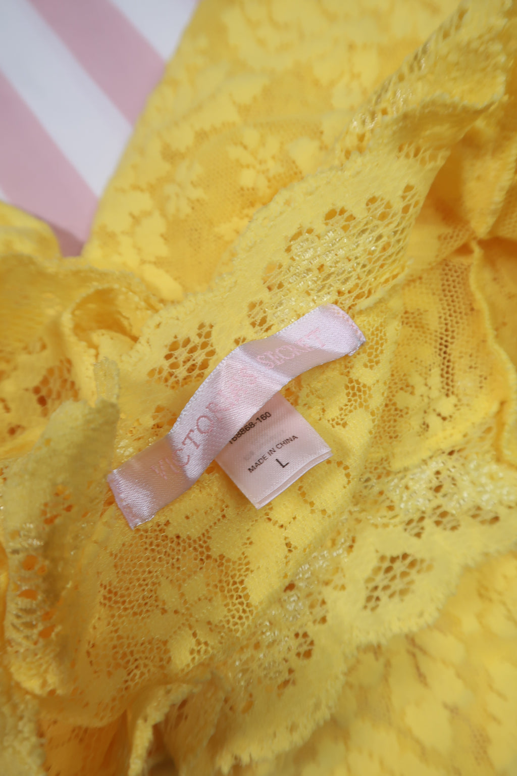 Yellow lace off-shoulder dress by Elektra Vintage, showcasing delicate lace details and a flattering silhouette.