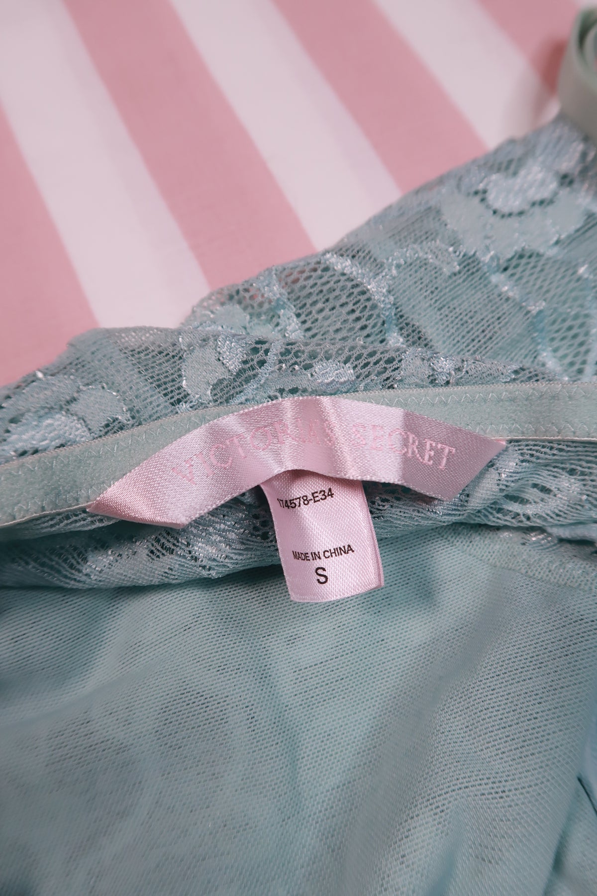 Vintage 2000s Victoria’s Secret mint blue lace corset slip dress by Elektra Vintage displayed on a hanger.