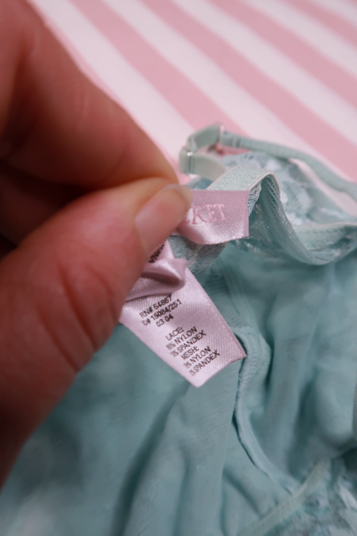 Vintage 2000s Victoria’s Secret mint blue lace corset slip dress by Elektra Vintage displayed on a hanger.