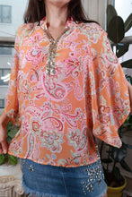 Load image into Gallery viewer, Women's vintage Y2K orange paisley peasant blouse with sequin trim by Elektra Vintage, featuring long sleeves and boho style.
