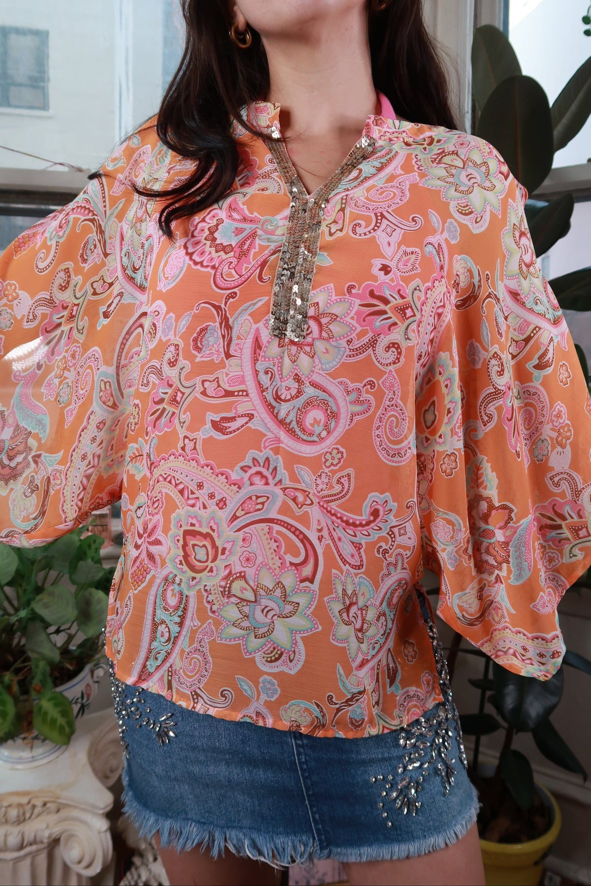 Elektra Vintage women's peasant blouse with orange paisley print and sequin trim, vintage Y2K style, long sleeve top.