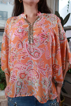 Load image into Gallery viewer, Women's vintage Y2K orange paisley peasant blouse with sequin trim by Elektra Vintage, featuring flowy fabric and boho style.
