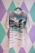Men's vintage Elektra Wildlife T-shirt with all-over loon and nature graphic, made by Anvil, showcasing a detailed wildlife design.