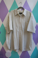 Load image into Gallery viewer, Vintage 90s Eddie Bauer men's green stripe cotton seersucker button-up shirt from Elektra Vintage, showcasing collar and front buttons.
