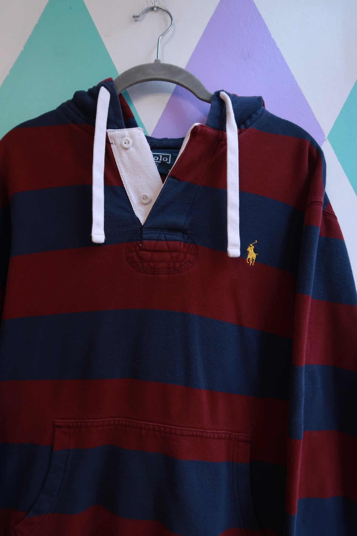 Vintage 2000s Polo Ralph Lauren striped rugby hoodie sweatshirt for men, styled with classic collar and bold stripe pattern.