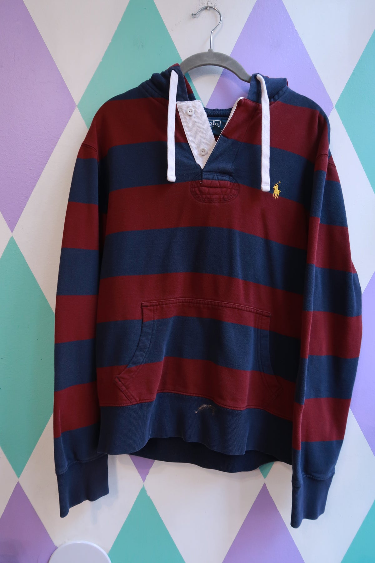 Vintage 2000s Polo Ralph Lauren striped rugby hoodie sweatshirt for men, featuring classic athletic style and bold color stripes.