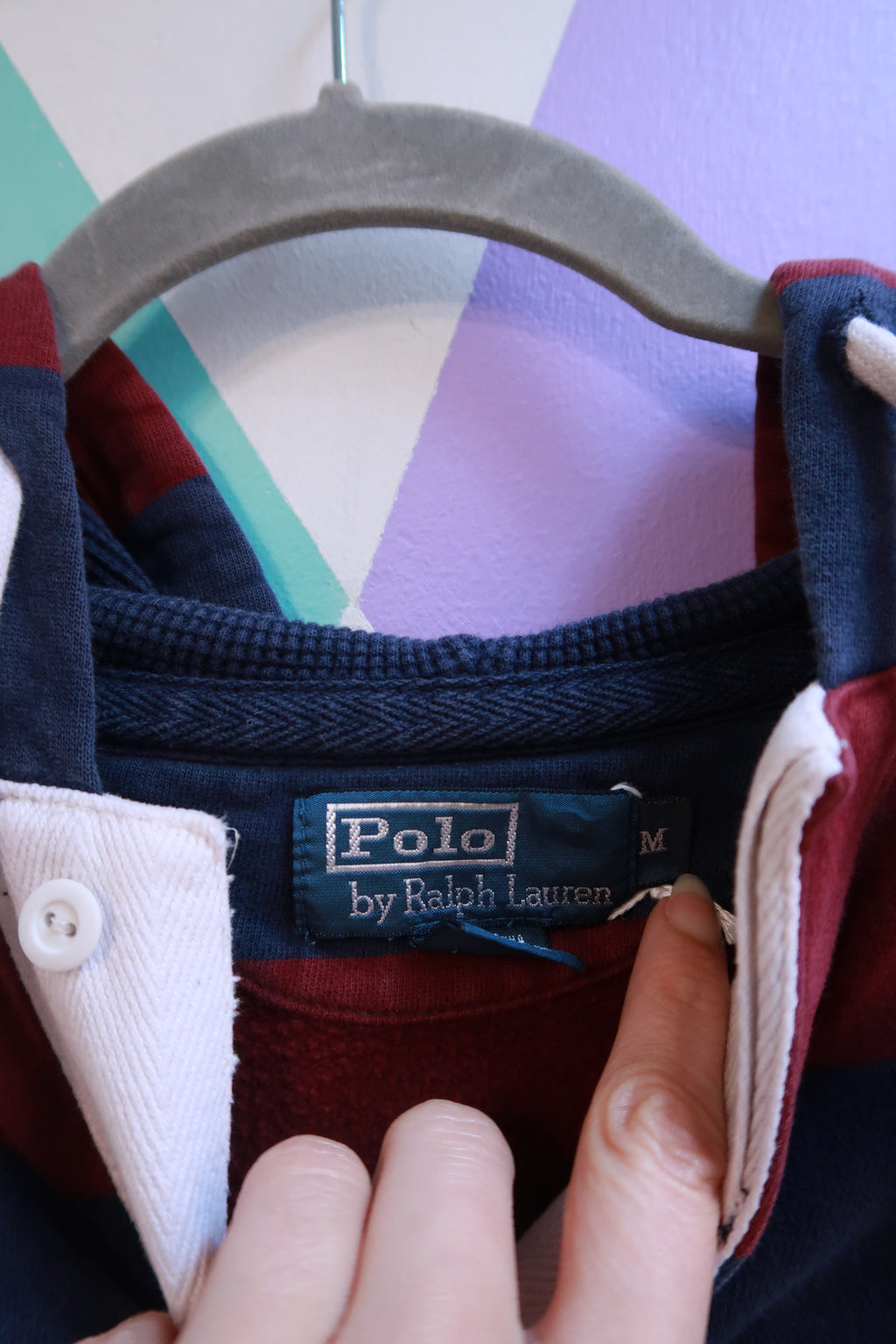 Men's vintage Polo Ralph Lauren striped rugby hoodie sweatshirt from the 2000s, featuring classic athletic style and bold color stripes.