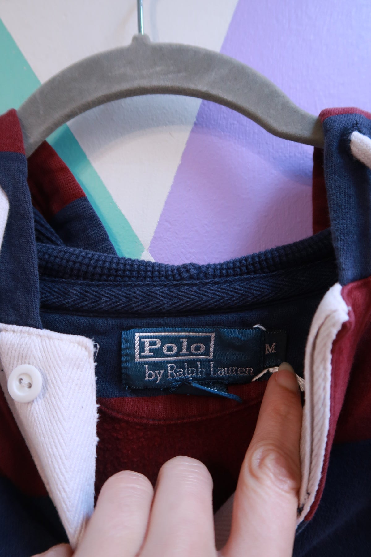 Men's vintage Polo Ralph Lauren striped rugby hoodie sweatshirt from the 2000s, featuring classic athletic style and bold color stripes.