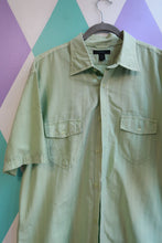 Load image into Gallery viewer, Men's vintage sage green short sleeve button-up shirt by Elektra Vintage, 2000s Express style, shown on a hanger.
