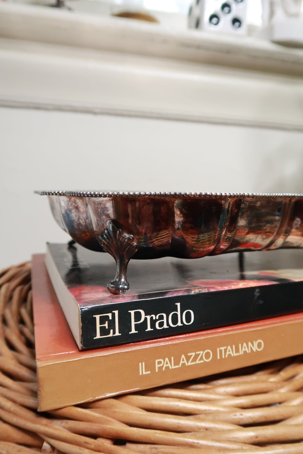 Vintage silver plate divided serving tray with scalloped edges and ornate feet, by Elektra Vintage, displayed on a wooden surface.