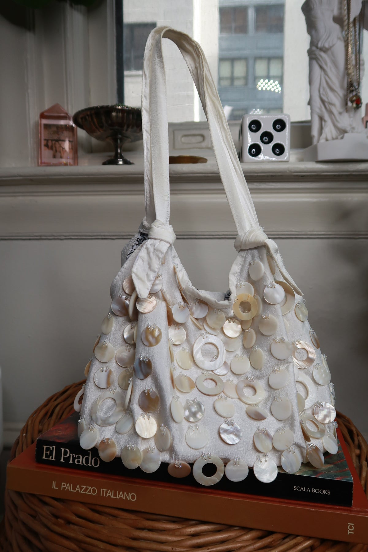 Vintage Elektra Y2K cream satin shoulder bag with beaded mother of pearl shell accents and elegant shoulder strap.