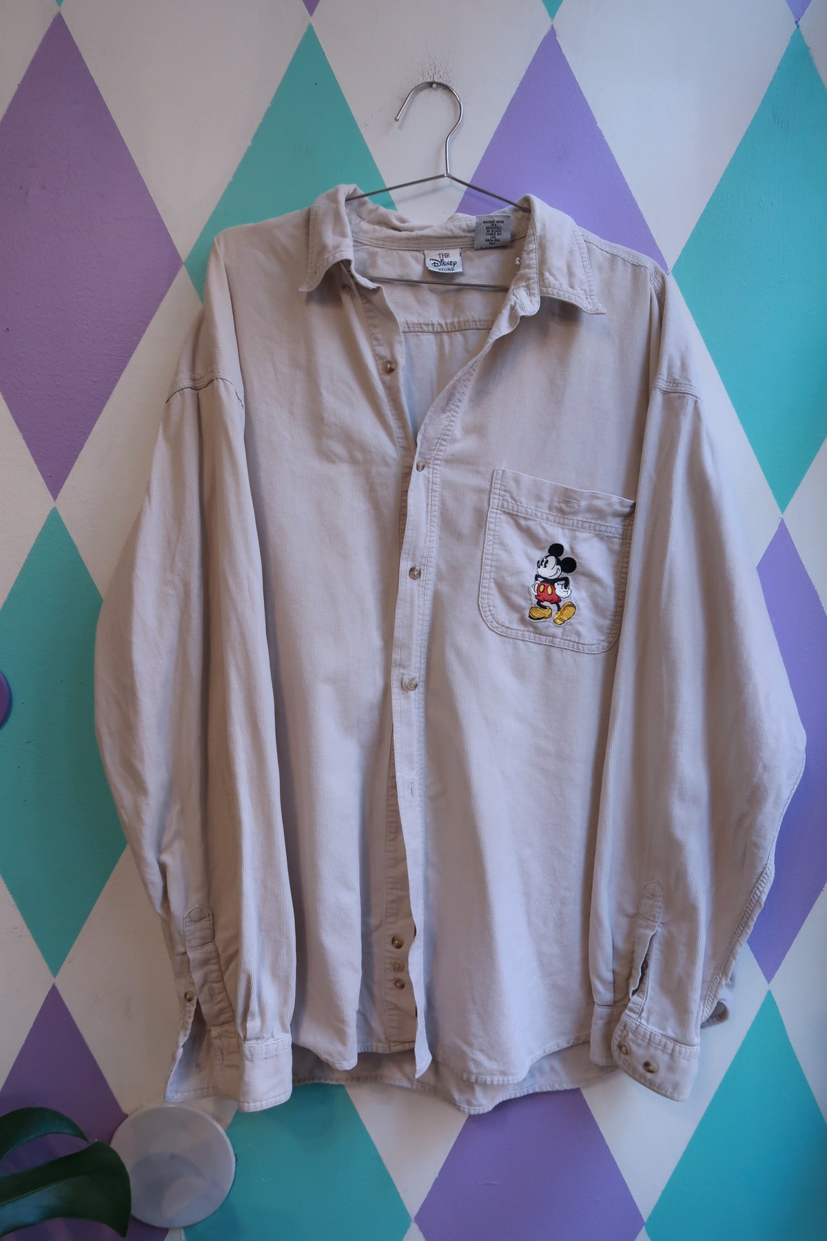 Beige vintage men's long sleeve button-up shirt with embroidered Mickey Mouse, by Elektra Vintage.