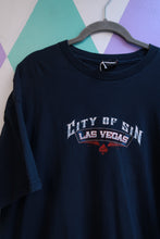Load image into Gallery viewer, Black men's graphic T-shirt from Elektra Vintage featuring vintage 2000s Las Vegas City of Sin casino pin-up design.
