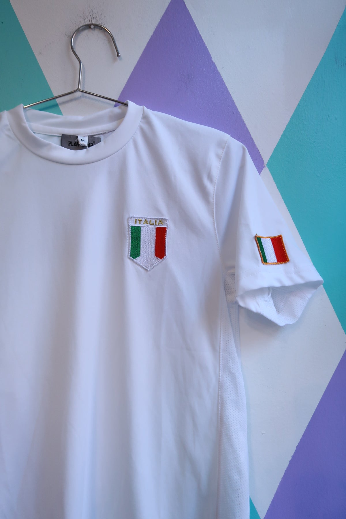 White vintage 2000s Italia athletic T-shirt by Elektra Vintage featuring halftone graphic and Italian flag design.