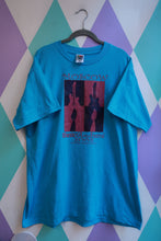 Load image into Gallery viewer, Elektra Vintage men's blue graphic T-shirt featuring vintage 2002 Moscow Music &amp; Arts Festival souvenir design.
