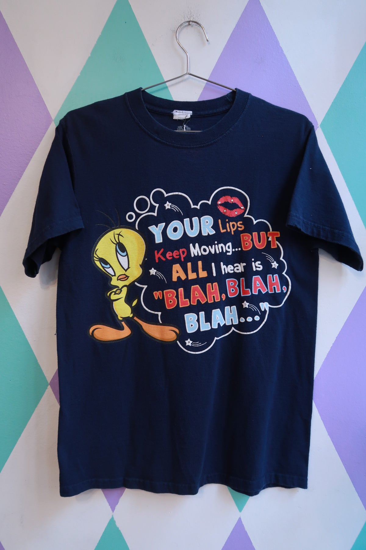 Men's vintage navy graphic T-shirt featuring Tweety Bird and "Blah Blah Blah" text from Elektra Vintage, Looney Tunes style.