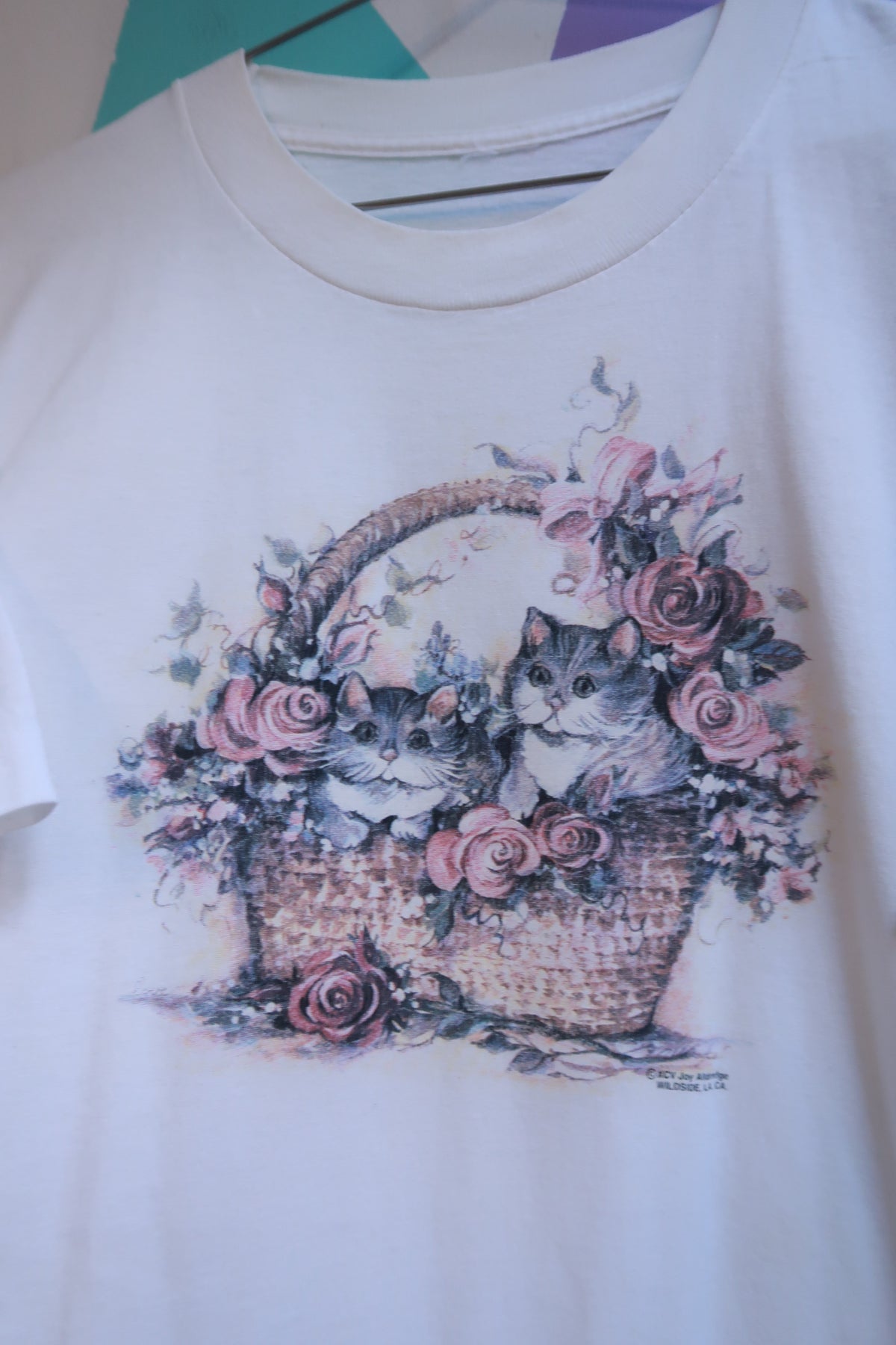 White men's T-shirt with vintage cottagecore kittens in basket floral graphic, by Elektra Vintage.
