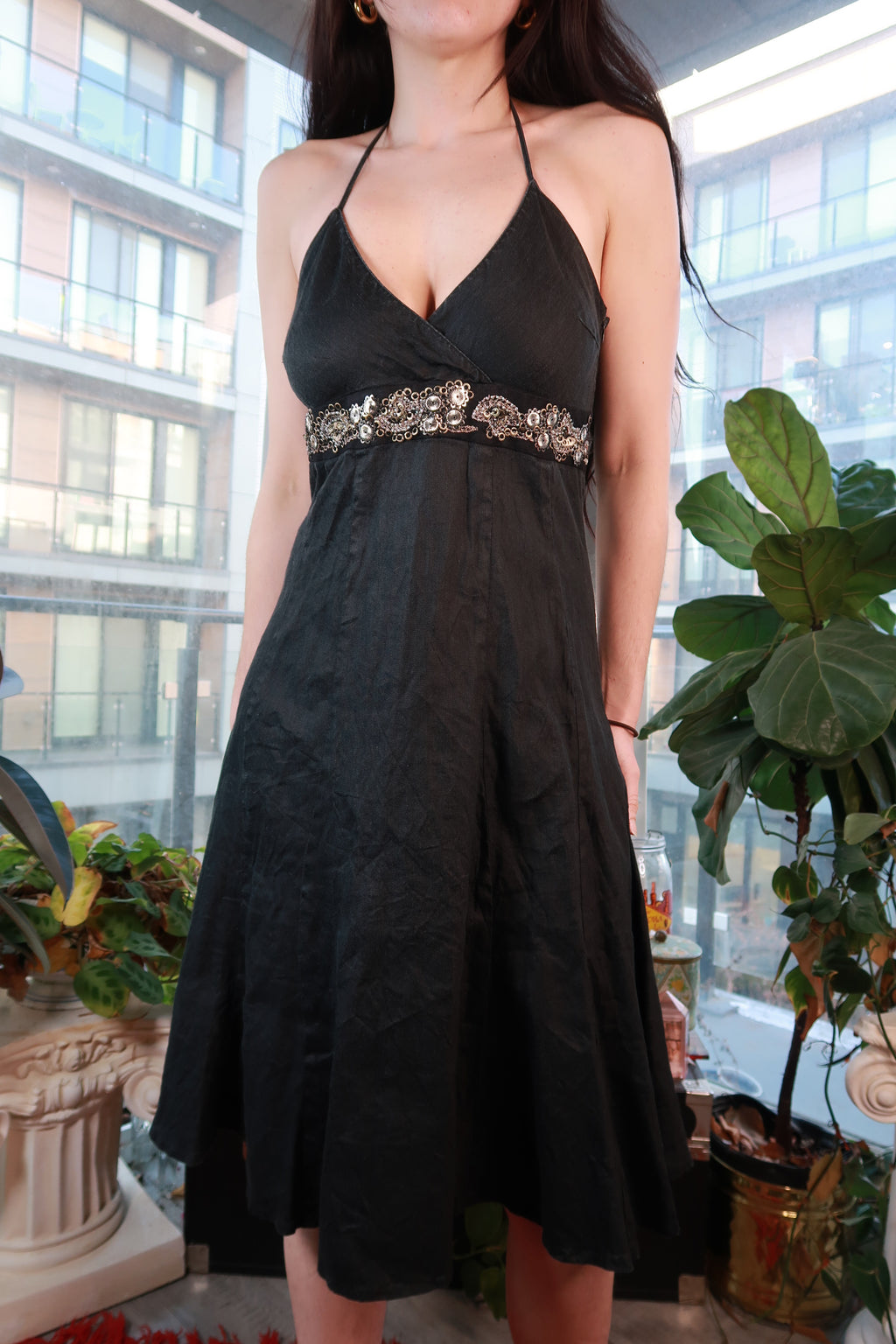 Vintage 2000s black embellished halter dress with beaded empire waist, perfect for Y2K-inspired parties.