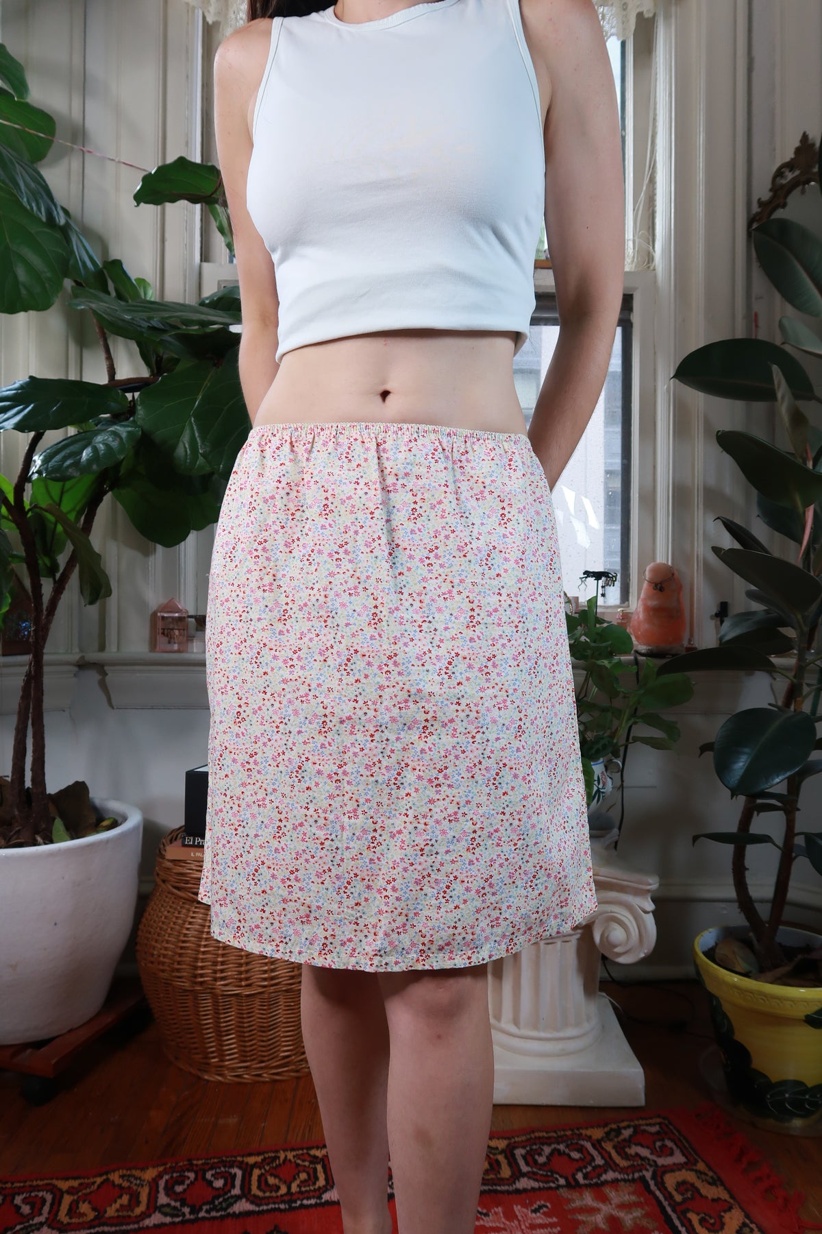 White ditsy floral midi skirt by Old Navy, vintage 2000s style, featuring a flowy fabric and floral pattern from Elektra Vintage.