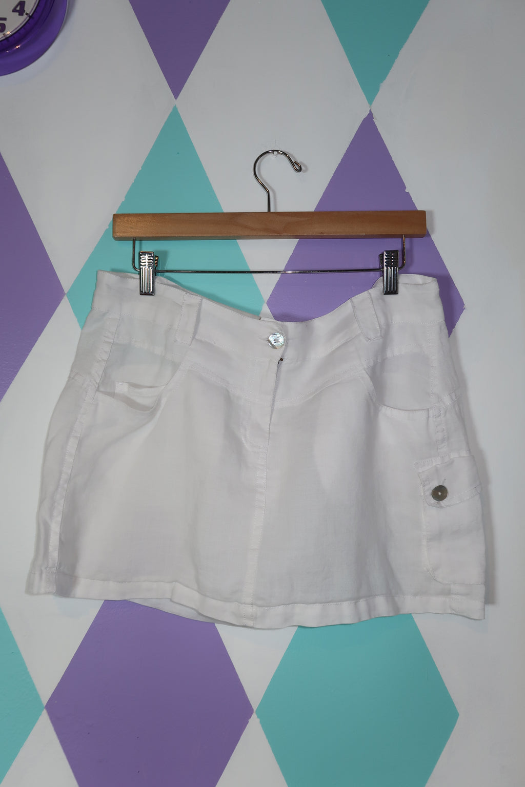 Vintage white linen cargo mini skirt by Elektra Vintage, women's casual bottom with pockets and a relaxed fit.