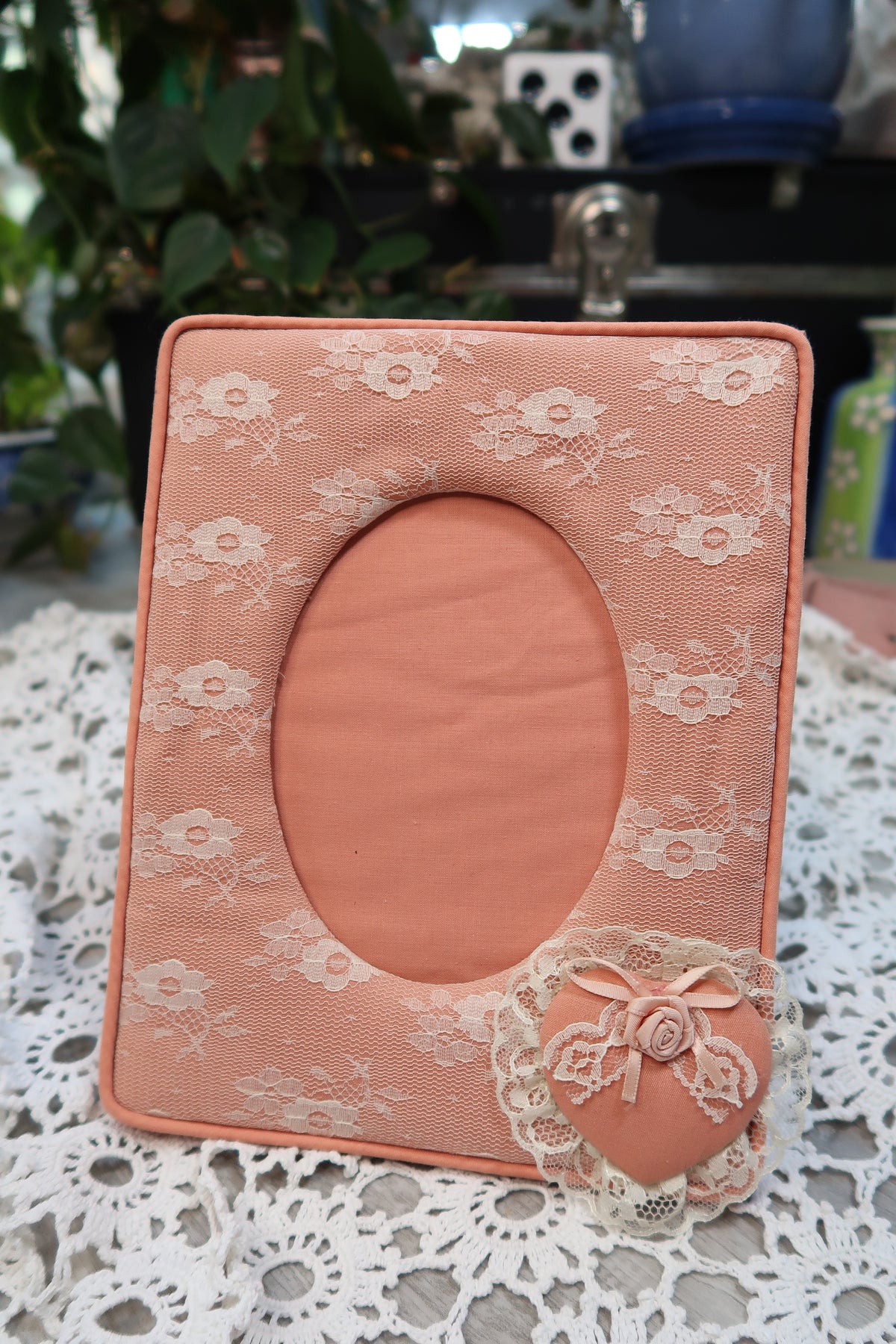 Vintage pink lacy fabric picture frame by Elektra Vintage, showcasing intricate lace details and soft pink color.