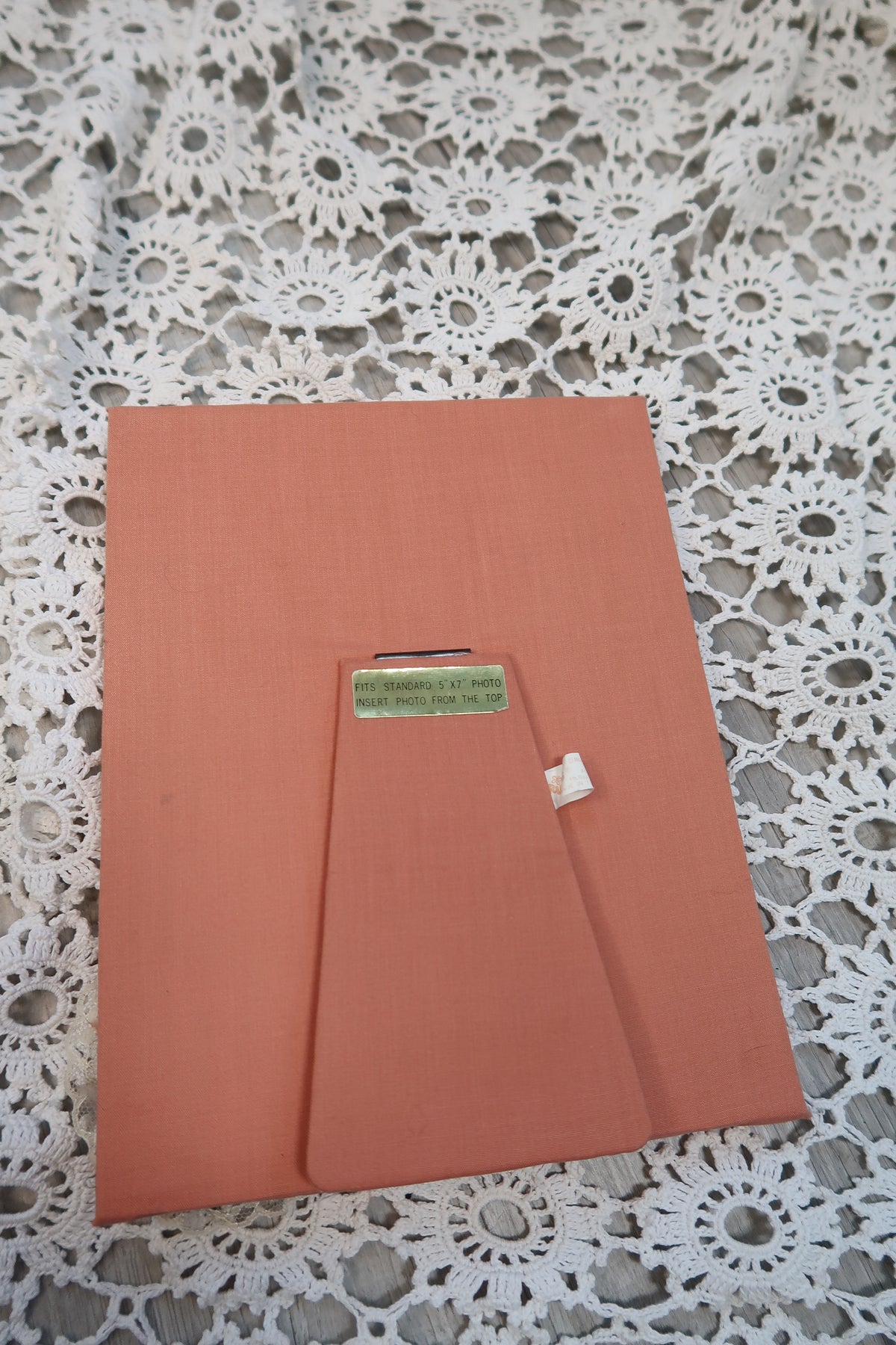 Vintage pink lace fabric picture frame by Elektra Vintage featuring delicate lace details and a classic design.