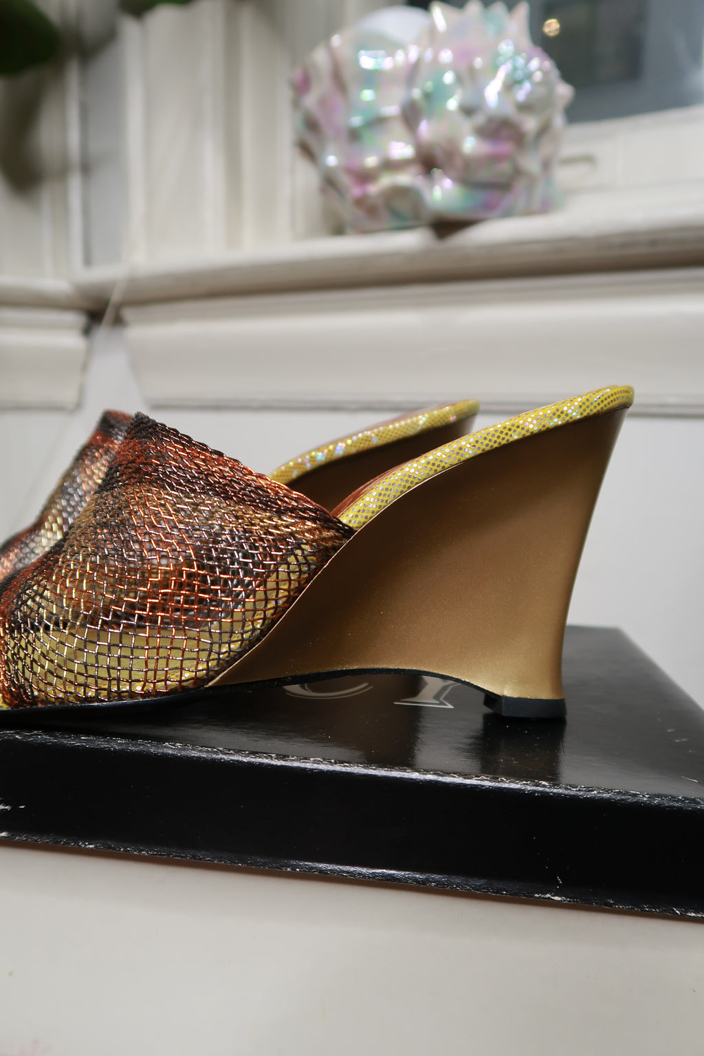Vintage 2000s Elektra Metallic Mesh Wedge Mules with open toes and ankle straps, showcasing a retro-inspired footwear design.