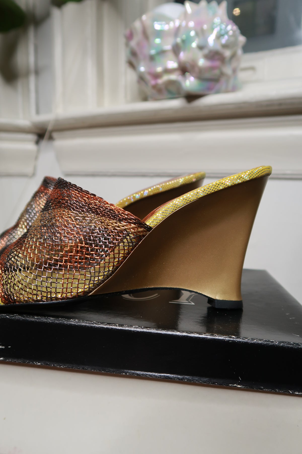 Vintage 2000s Elektra Metallic Mesh Wedge Mules with open toes and ankle straps, showcasing a retro-inspired footwear design.
