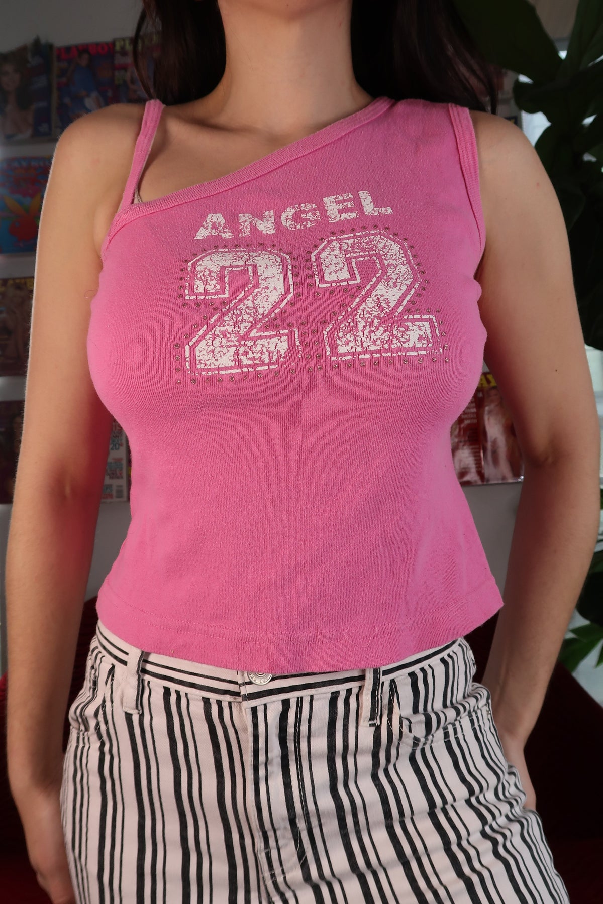 Pink 2000s Angel 22 asymmetrical women's tank top by Elektra Vintage, featuring a stylish vintage design and unique asymmetrical cut.